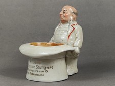 Werbefigur HUTHAUS H.BUCHER
