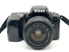 Nikon F50 + Sigma 70-210mm