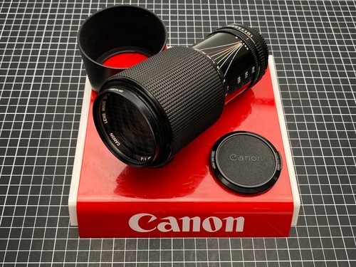 Canon 210mm zoom - f/4, ✅