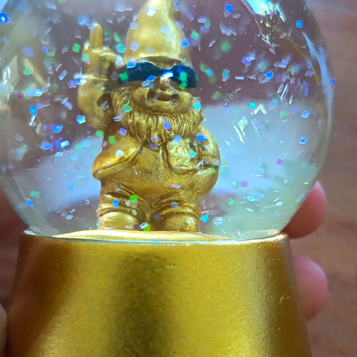 Schneekugel gold mit