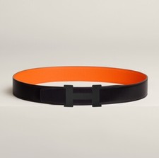 Hermes Constance Leder-Wendegürtel schwarz/orange 38 mm Größe 100