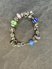 Trollbeads Armband mit 16 Charms, 20 cm, Silber