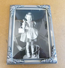 Rahmen aus Metall mit gewölbtem Glas