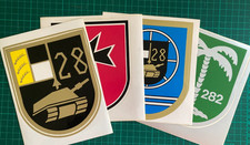 vier Wappen-Aufkleber aus der