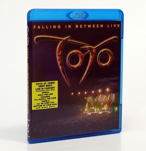 Toto falling between live - -,