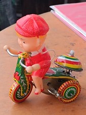 Altes Blechspielzeug++KIND auf