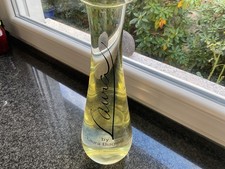 Laura. by Laura Biagiotti. Grossfactise. Glas.