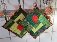 Topflappen grün geometrisch