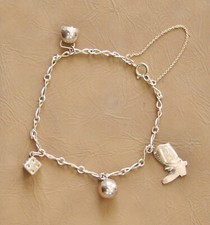 Bettelarmband Gold 333/8k mit 4 Anhängern, ca. 9,65g Gesamtgewicht