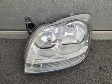 Nissan Almera Tino Scheinwerfer Links Bj: 03-06