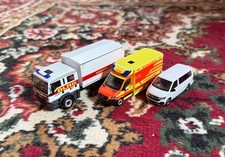 HERPA Einsatzfahrzeuge MAN MB-Sprinter VW T 6.1 DLRG RD H0