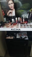 Alcina Kosmetik Rollwagen schwarz mit Produkten 
