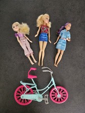 3 Barbie Puppen + Fahrrad