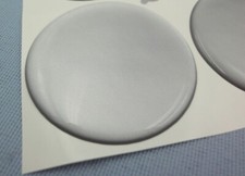 4 Silber Embleme für