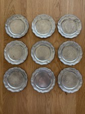 9 Untersetzer aus Zinn