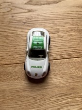 Darda Bahn Auto Polizei Porsche weiß/grün Motor funktionstüchtig