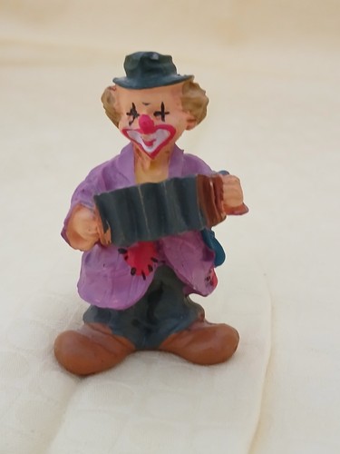 Kleiner clown mit bandoneon - kleiner,