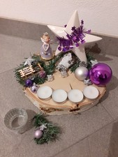 Adventsgesteck auf Holzscheibe, lila-silber dekoriert,mit künstl. Tannengrün
