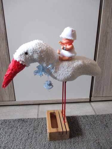 Storch mit baby und - storch,