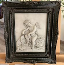 Wandrelief  Amor und Löwe