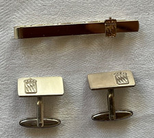 Manschettenknöpfe +