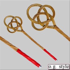 Teppichklopfer in Kleeblatt