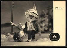 Sandmann streichelt einen