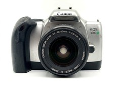 Canon eos 3000v - +,