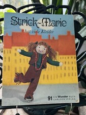 Strick-Marie hat viele Kleider