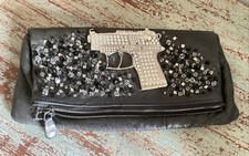 Leder Clutch von Camouflage Couture