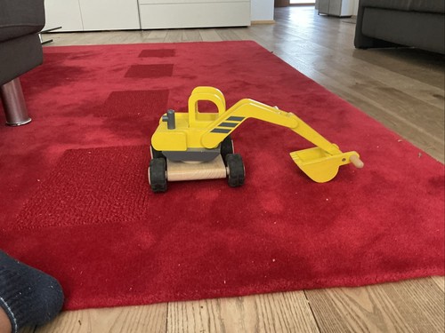 Gelber schaufelbagger aus - schaufelbagger,