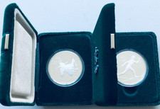 Künker: Kanada, 2 x 20 Dollar, 1986 Biathlon, 1986 Langlauf, je 1 Unze Silber PP