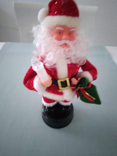 Weihnachtsmann mit kerzenlicht - weihnachtsmann,