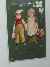 Künstler.AK Ein frohes neues Jahr 2Kinder,Brief,Blumenkorb gel.20.XII.09