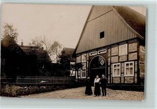 13067197 - 3490 Bad Driburg Familie steht vor dem Haus - gute Erhaltung AK
