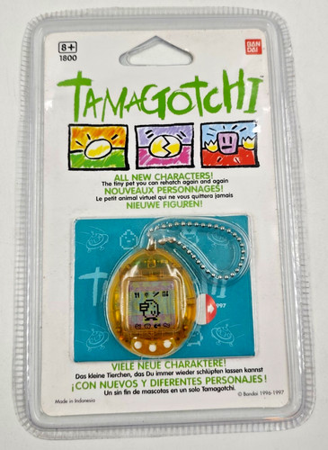 Bandai tamagotchi 1800 gold - bandai, #1800