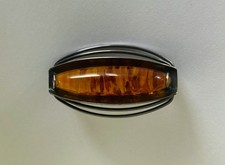 Fischlandschmuck, Brosche in