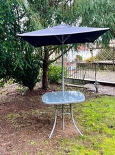 Gartentisch mit Glasplatte und