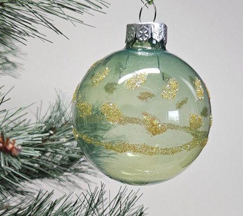 Christmas ball glass hand