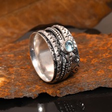 Blauer Topas Spinner Band 925