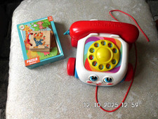 Fisher Price - Drehscheiben Telefon zum hinterher ziehen - lustig