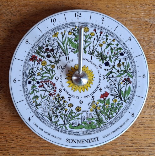 Helios sonnenuhr blumenuhr - helios,