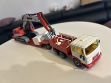 Siku 4012 MAN 8.156 Tieflader mit Menck M500H Großbagger 1/55