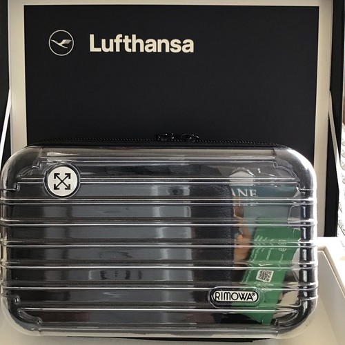 Off rimowa amenity kit - x,