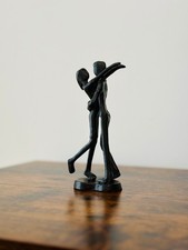 Cast Iron Hugging Pair -