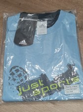 Adidas Just Sports T-Shirt –