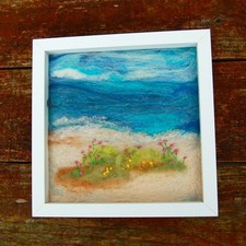 Blumen am Strand - gerahmtes