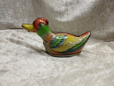 alte Blechente mit Schwungrad