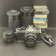 Nikon FE2 SLR Kamera Spiegelreflex - inkl. 4 Objektive + diverses Zubehör ✔️