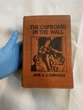THE CUPBOARD IN THE WALL
